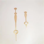 عقارب الساعة من الألومنيوم المطلي بالذهب